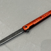 Captured_ecran2025-10-13115353 Stiletto M390 rouge - Ouverture assistée