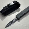 couteau automatique OTF lame spear point dentelee 9 cm acier 440 brise vitre etui cordura