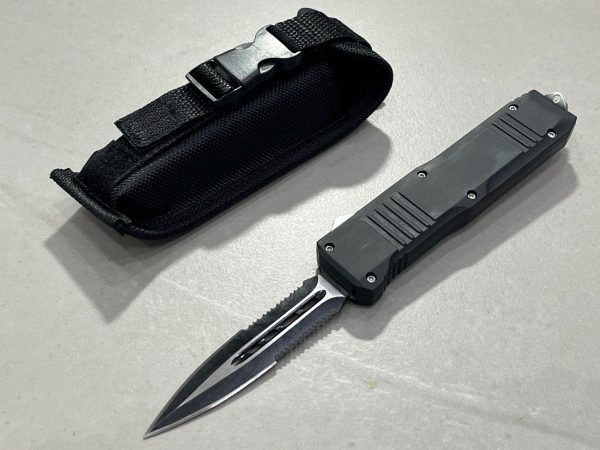 couteau automatique OTF lame spear point dentelee 9 cm acier 440 brise vitre etui cordura