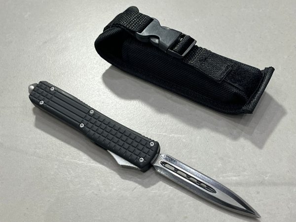 couteau automatique OTF à mécanisme optimisé lame spear point brise vitre vue principale