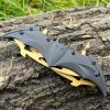 IMG_4167 couteau ouverture assistée double lame 30 cm manche G10 style batarang - Batman