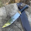 Couteau fixe Drop Point X46Cr13 poli miroir manche Werzalit