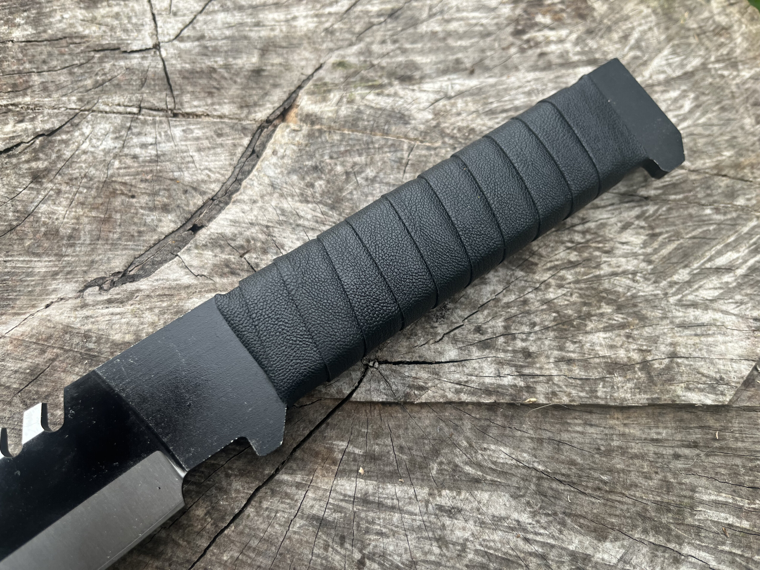 Manche à plate semelle intégrale avec enroulage de sangle en cuir